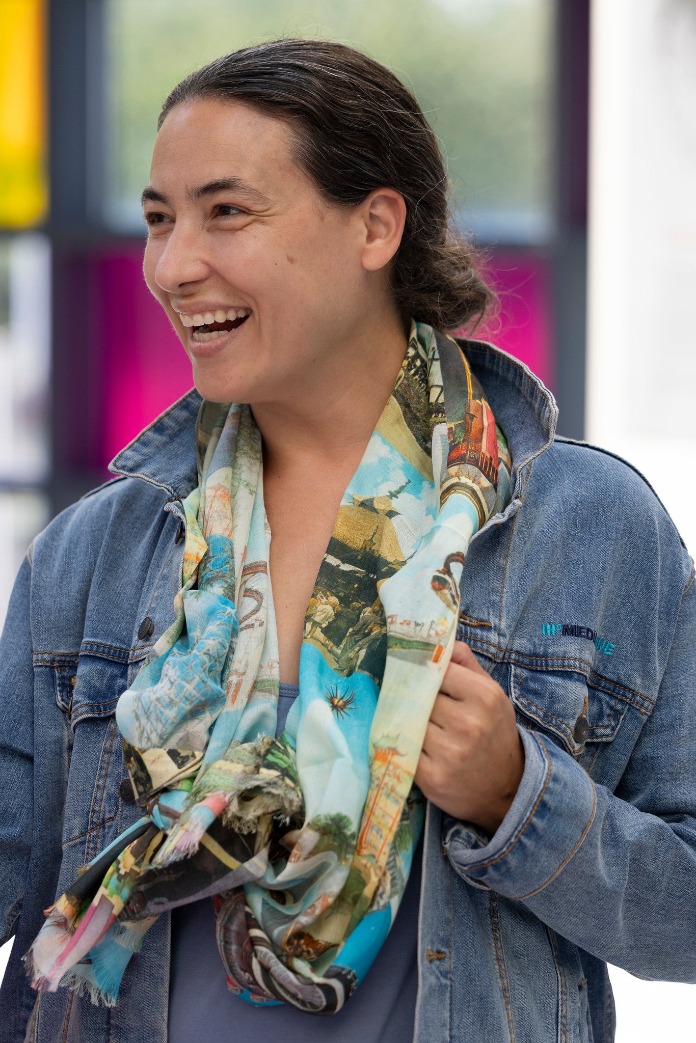 Woman smiling and laughing wearing the World&