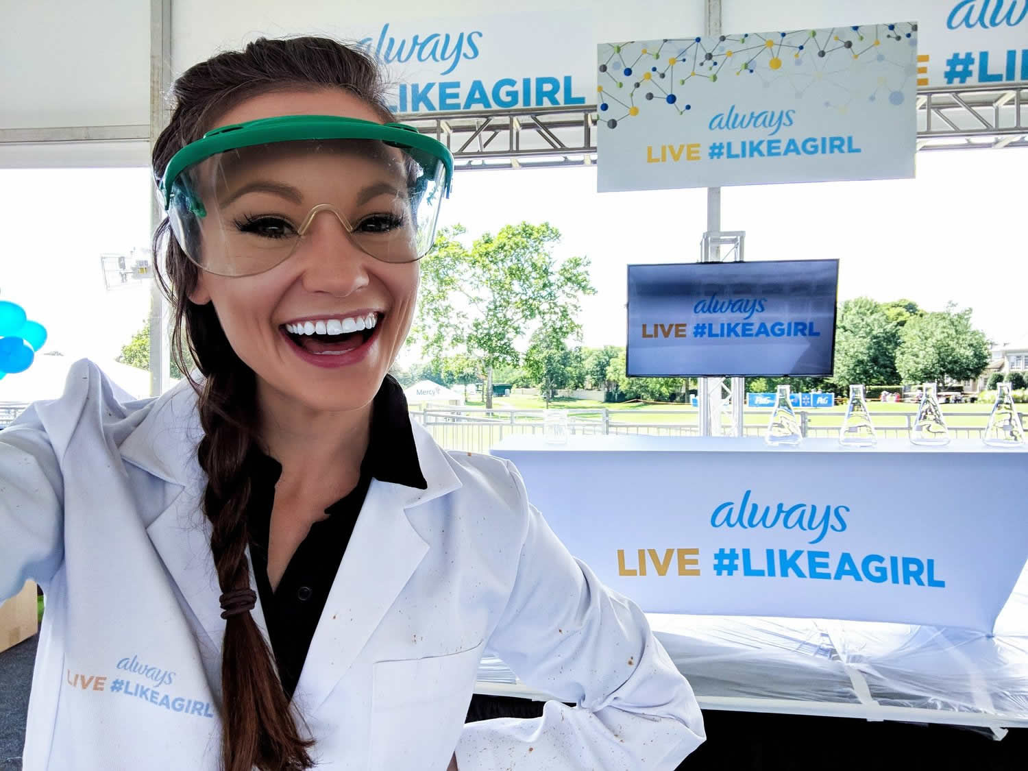 Author Emily Calendrelli smiling at a Science Trade Show