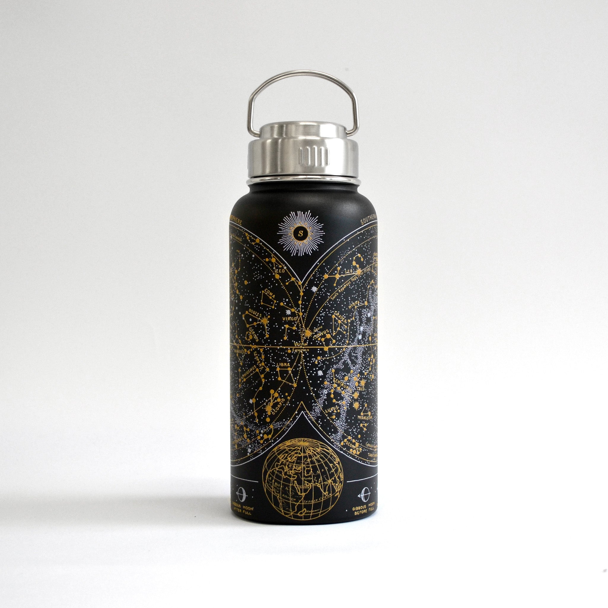 Water bottle in black with constellations on it in white and gold on white background