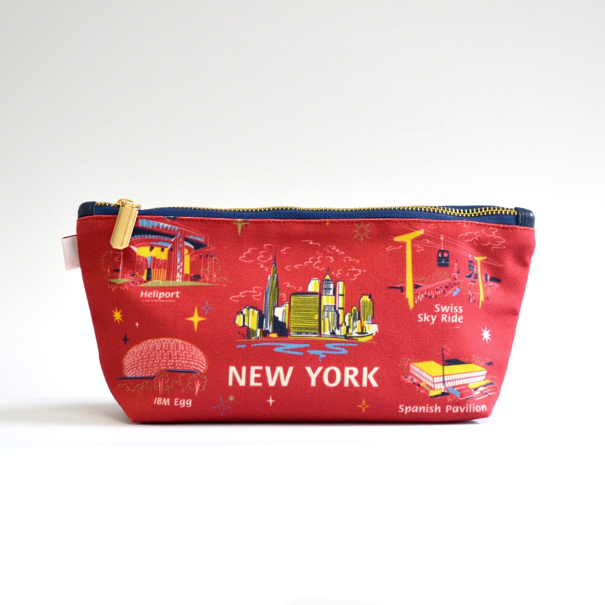 Red zipper pouch with images of Worlds Fair buildings on a white background