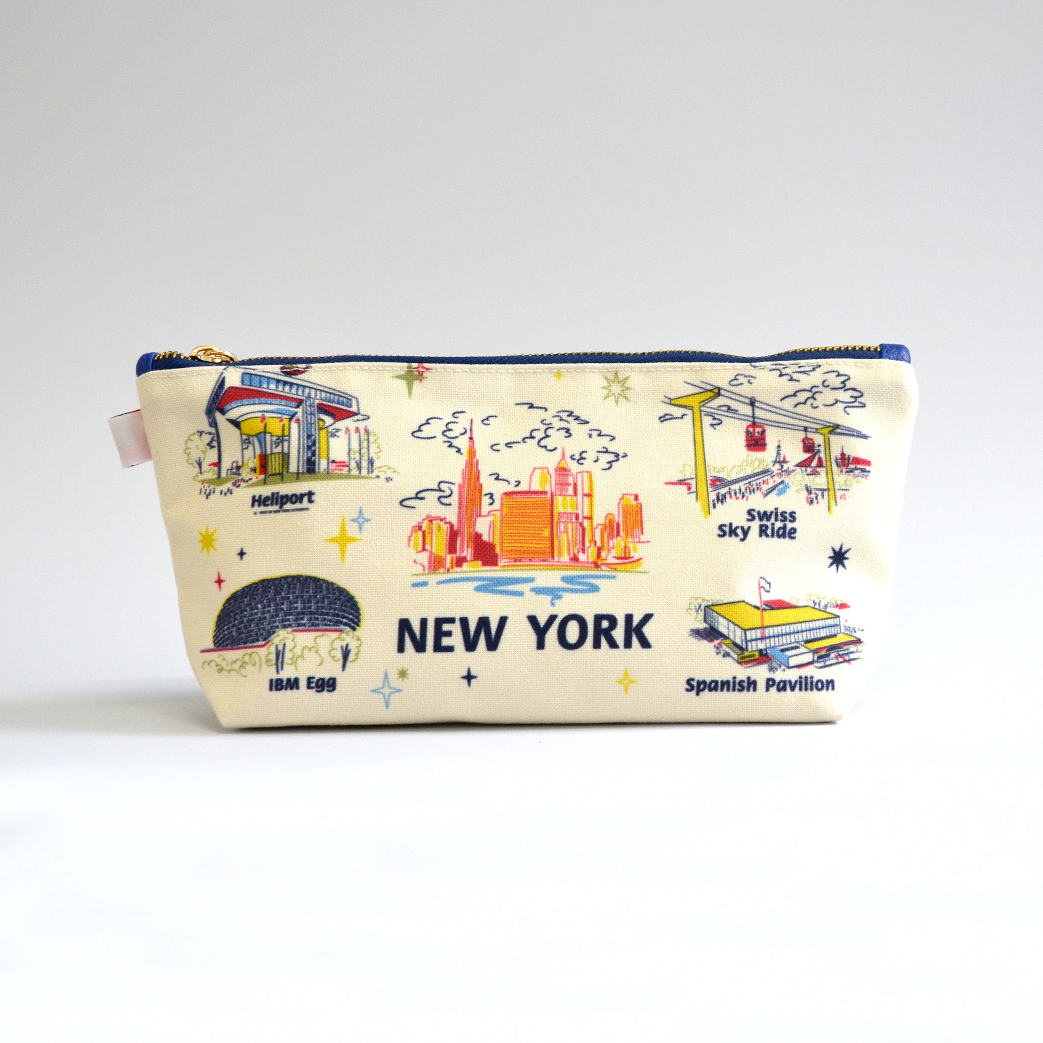 White zipper pouch with images of Worlds Fair buildings on a white background