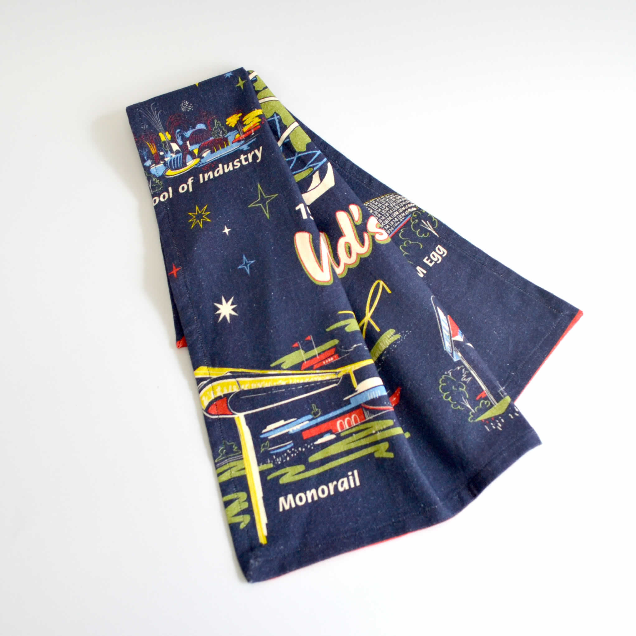 Dark blue tea towel showing images of the World&