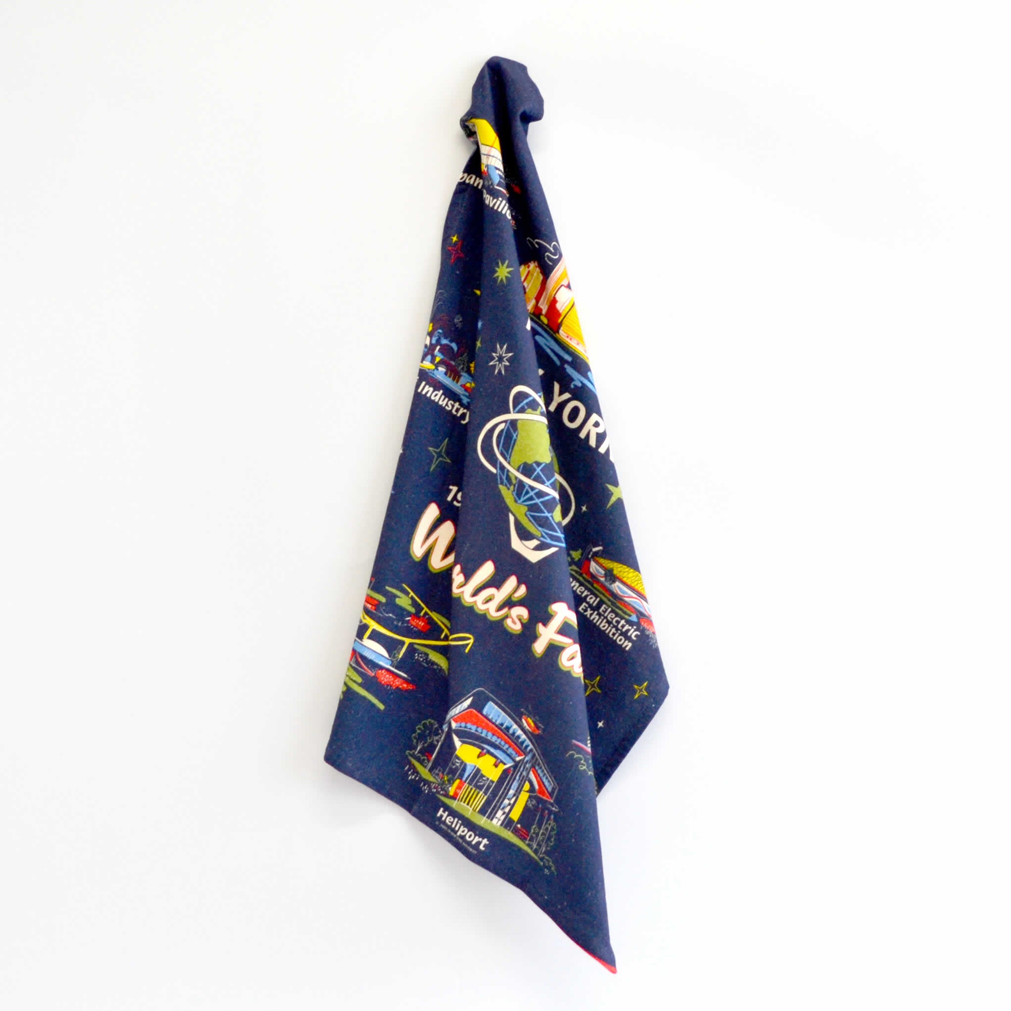 Blue worlds fair tea towel with images of the world&