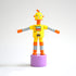 Yellow toy robot front view on white background