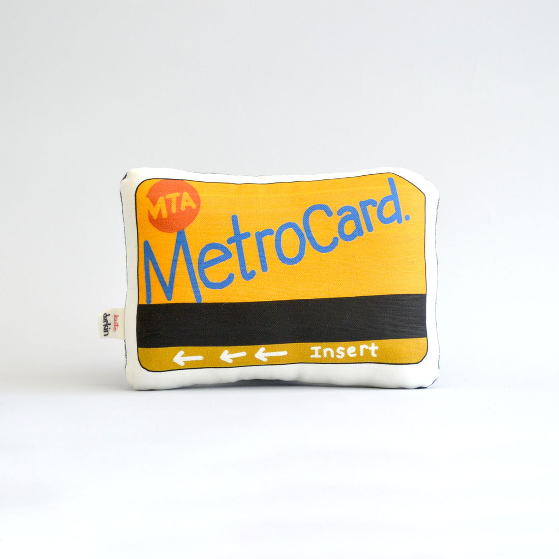 Decorative pillow shaped like an MTA MetroCard on a white background