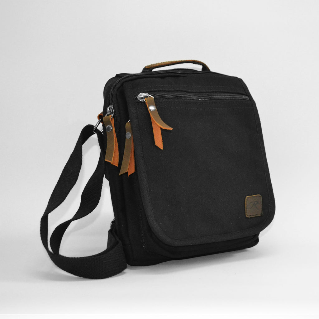 Black bag with a front zipper and a slightly larger zipper facing a little to the right