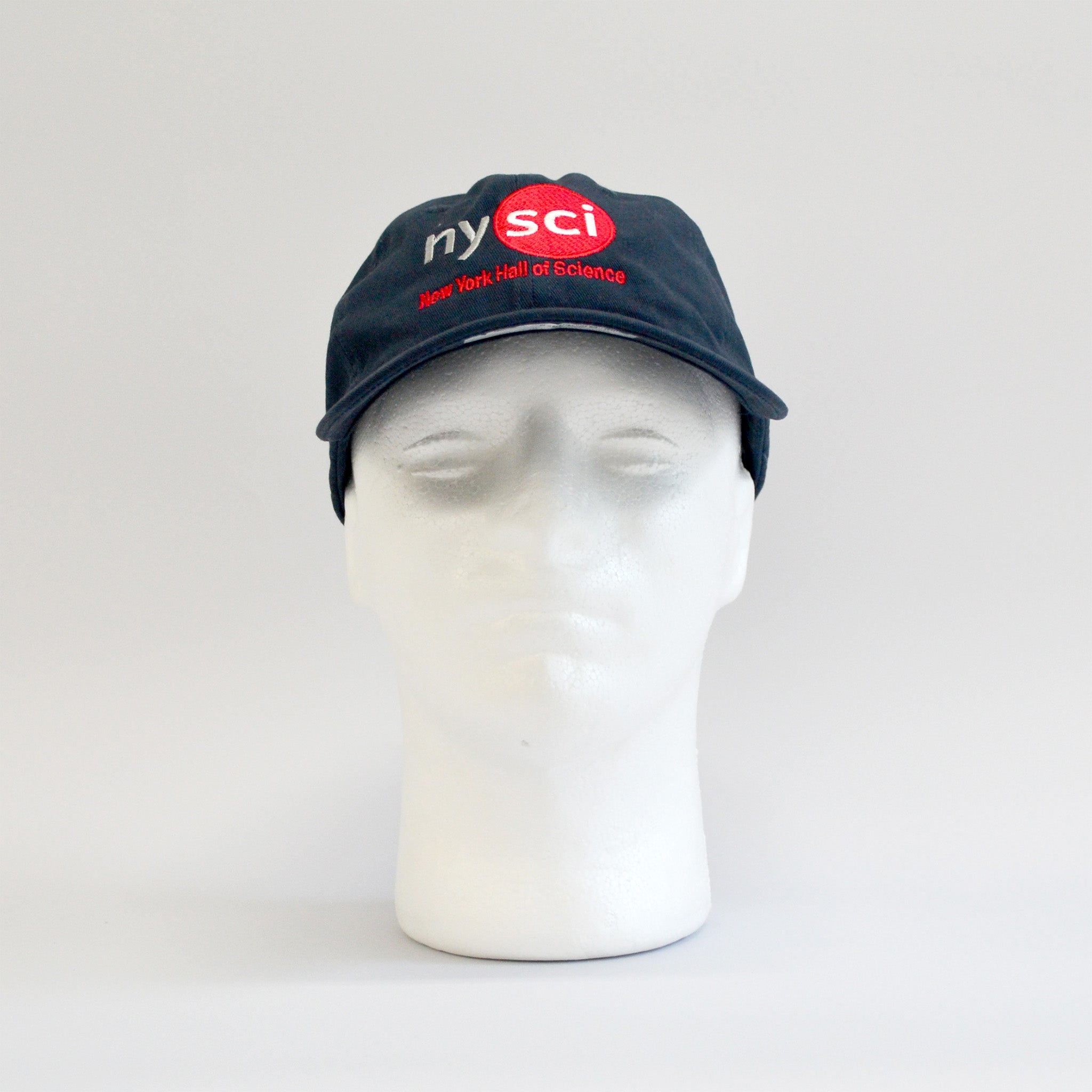 Navy blue baseball cap with NYSCI logo and lettering in red. front facing