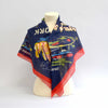 Blue World's Fair scarf draped over a mannequin showing the buildings of the 1964 World's Fair