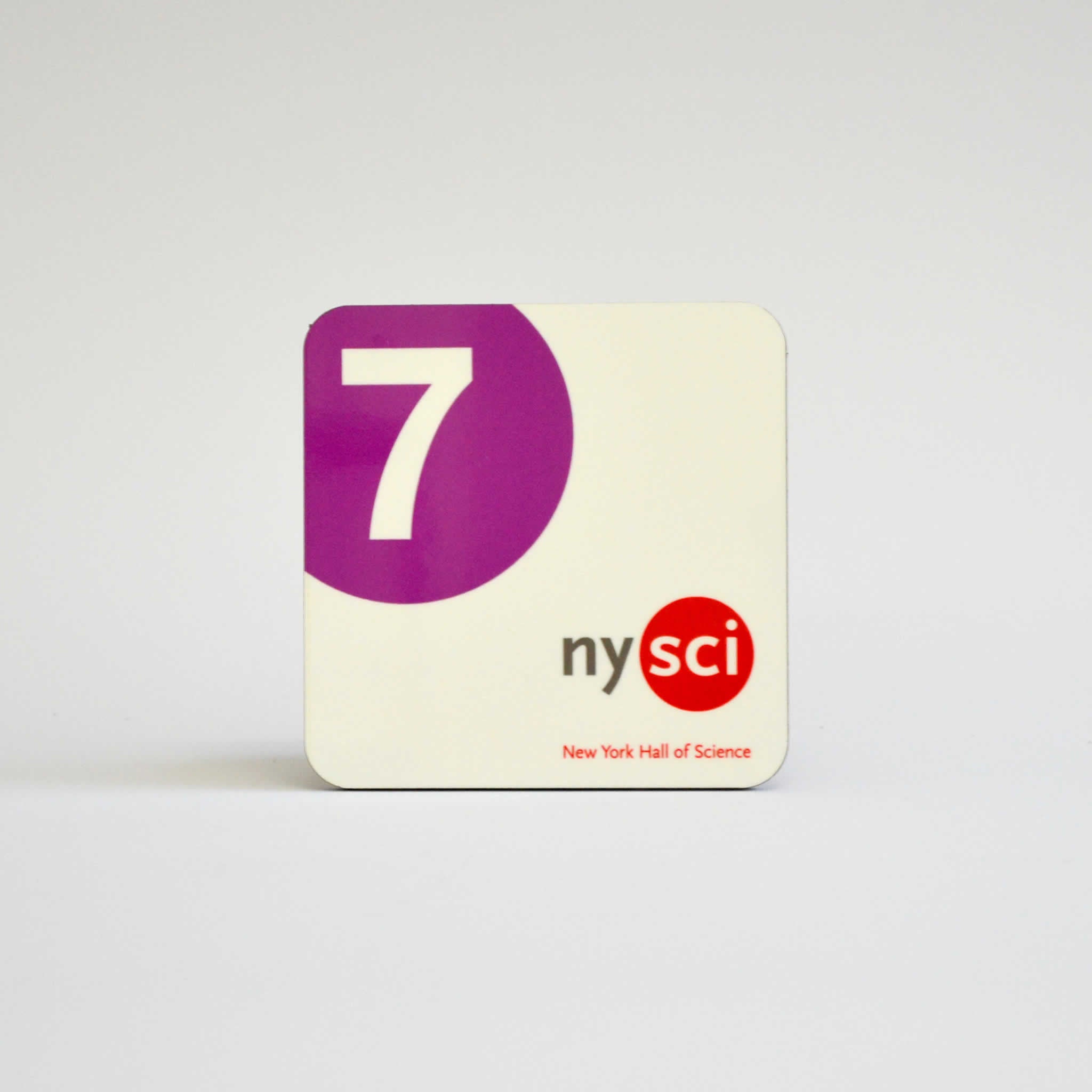 Drink coaster with the logo of the 7 Train in purple and the nysci logo in red