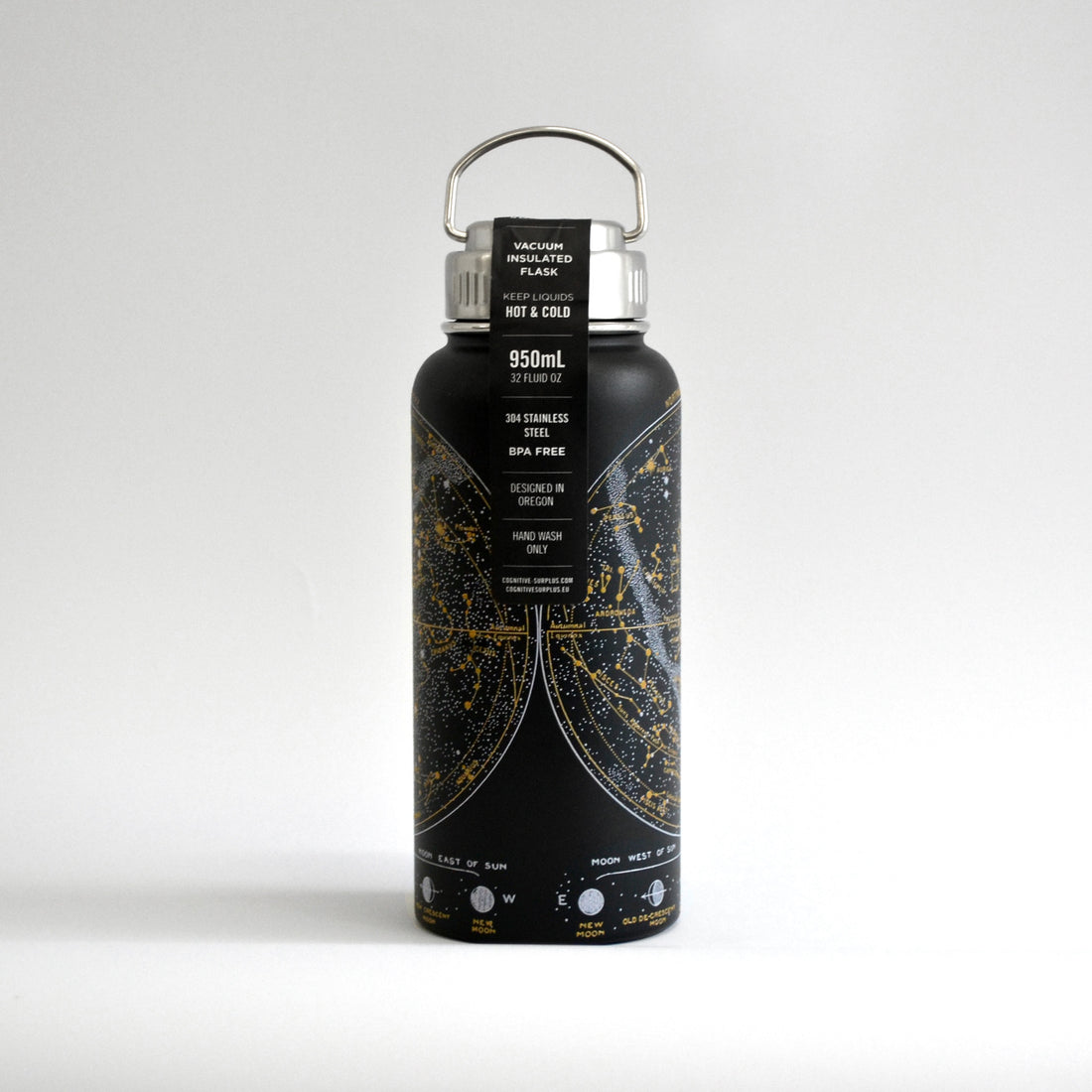 Water bottle in black with constellations on it in white and gold on white background - showing label - 950 ml.