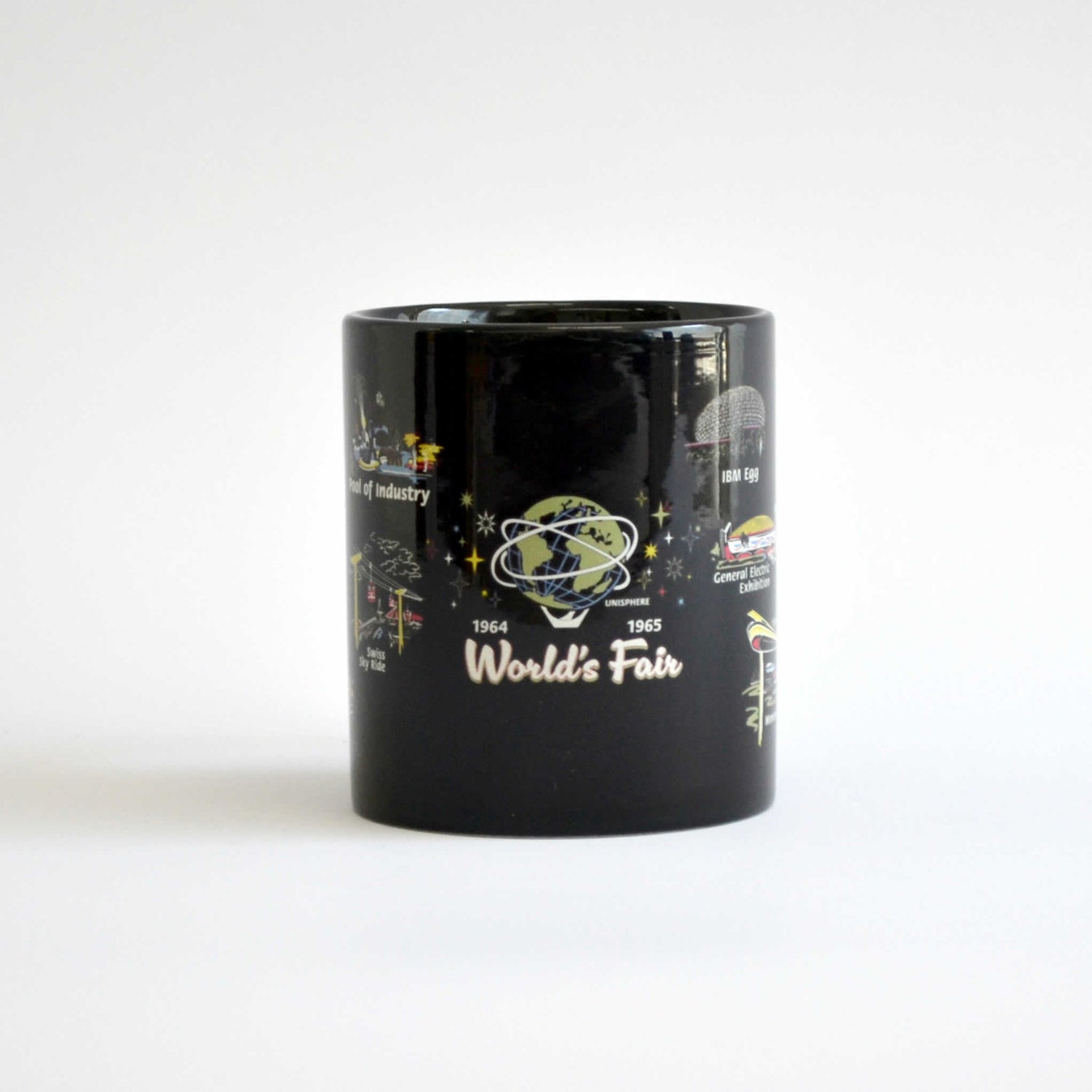 Side view of the Black mug with images of the world&