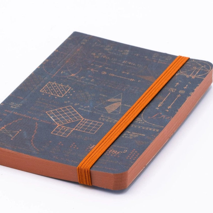 Dark blue notebook with math equations the cover - Top view laying flat on table