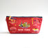 Red zipper pouch with images of Worlds Fair buildings on a white background