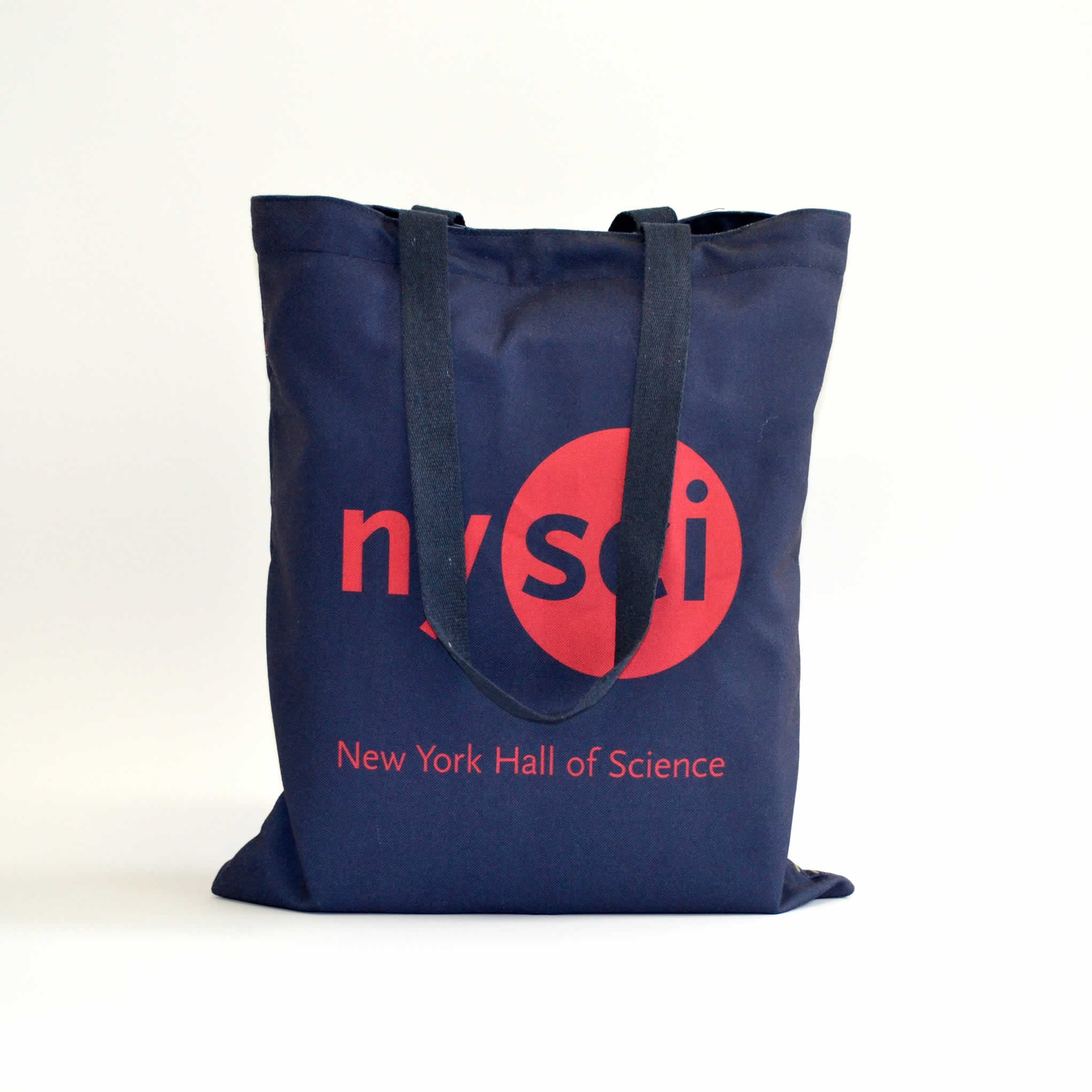 Dark blue tote bag with a large nysci logo on the front