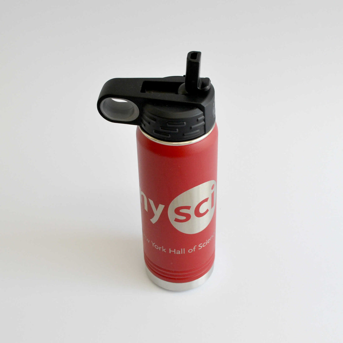 Red water bottle with solver logo of nysci Hall of Science Museum on it